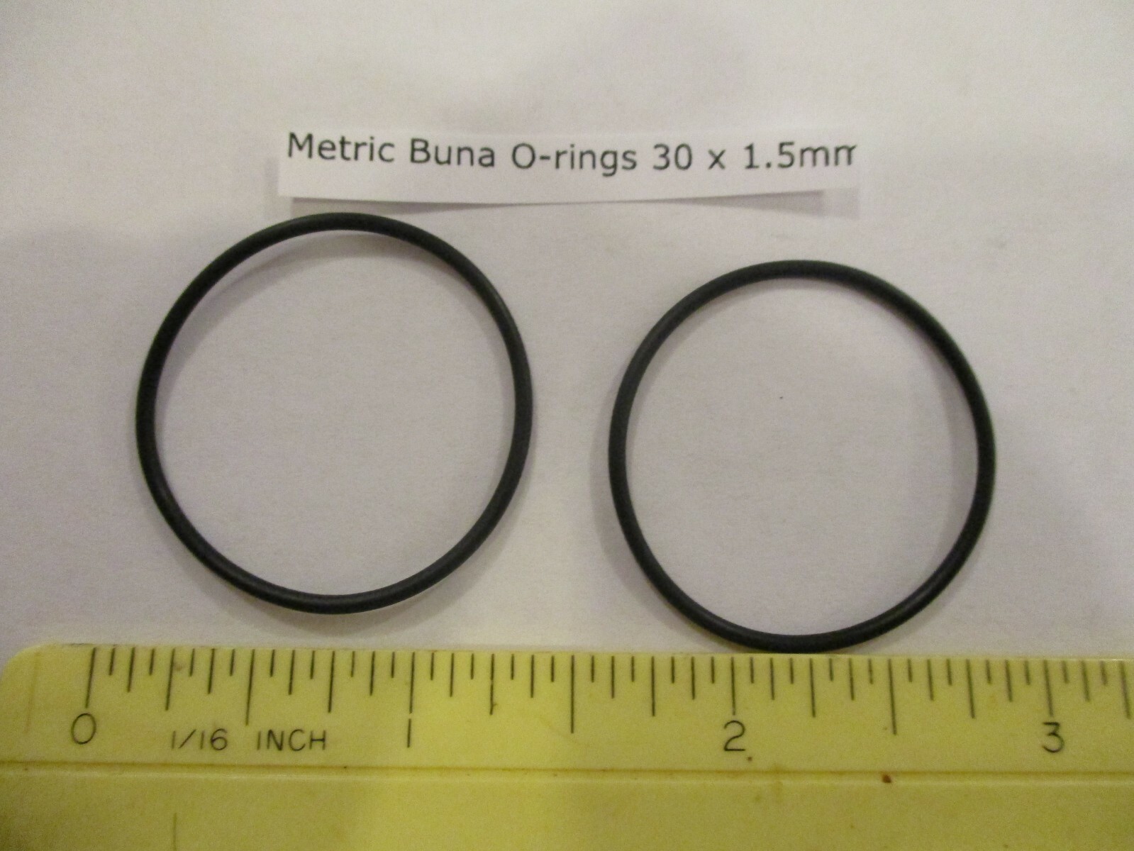 30mm ID x 33mm OD x 1.5mm thick O-ring. Buna-70. Quan 2.