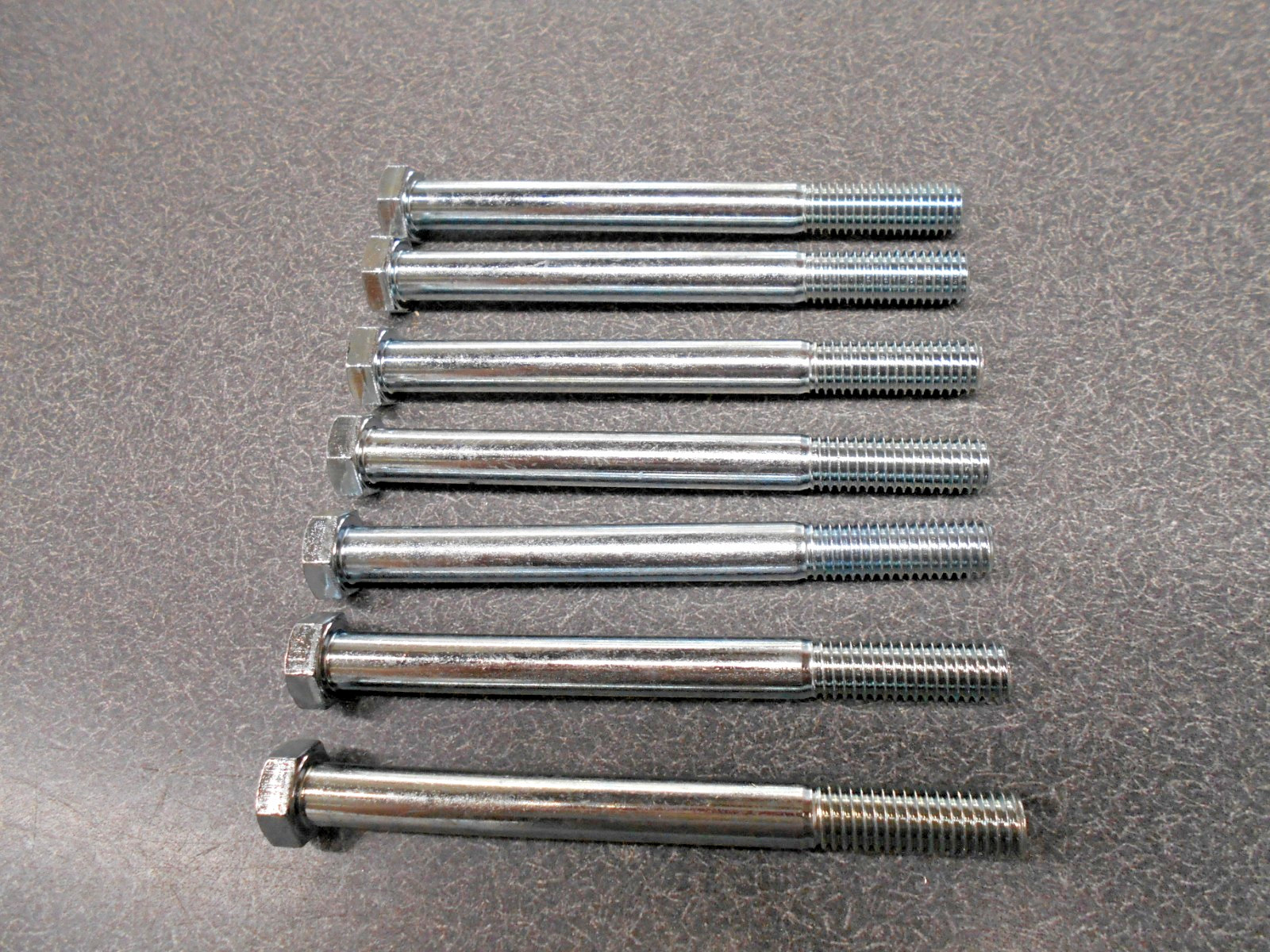 1/2″ x 5-1/2″ Bolt. (Quantity 7) Grade 5 Capscrew Hex Head Bolt. Coarse #13. NOS