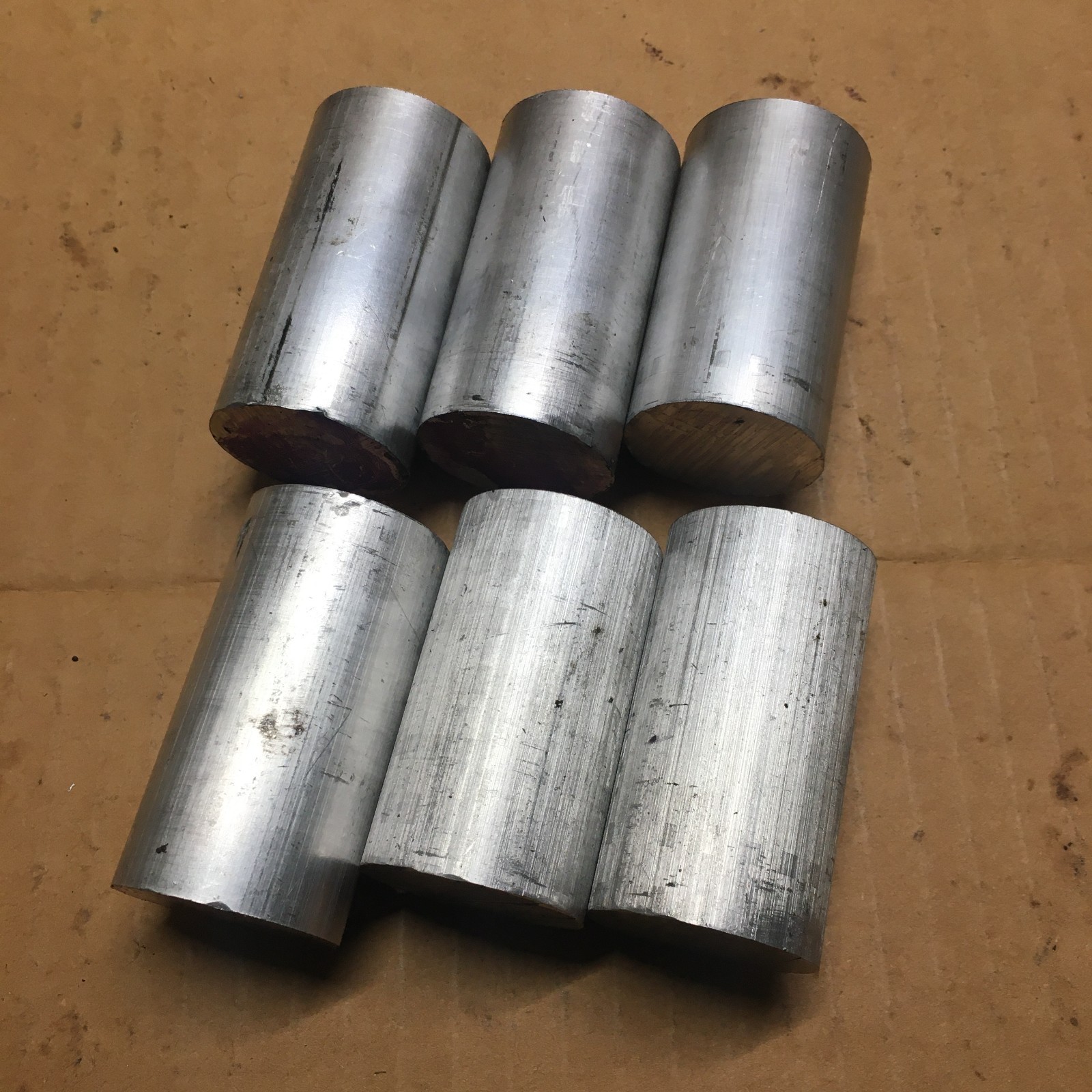1 1/4 inch diameter 6061-T651 aluminum bar end drops, scraps. short pieces.