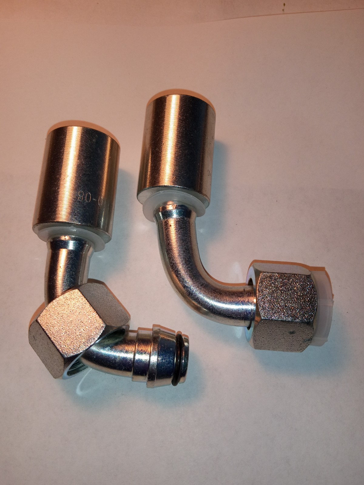 M22 x 1.5 Metric hydraulic fitting 90° Crimp On Ferrule, 20491-22-08 & 00110-08